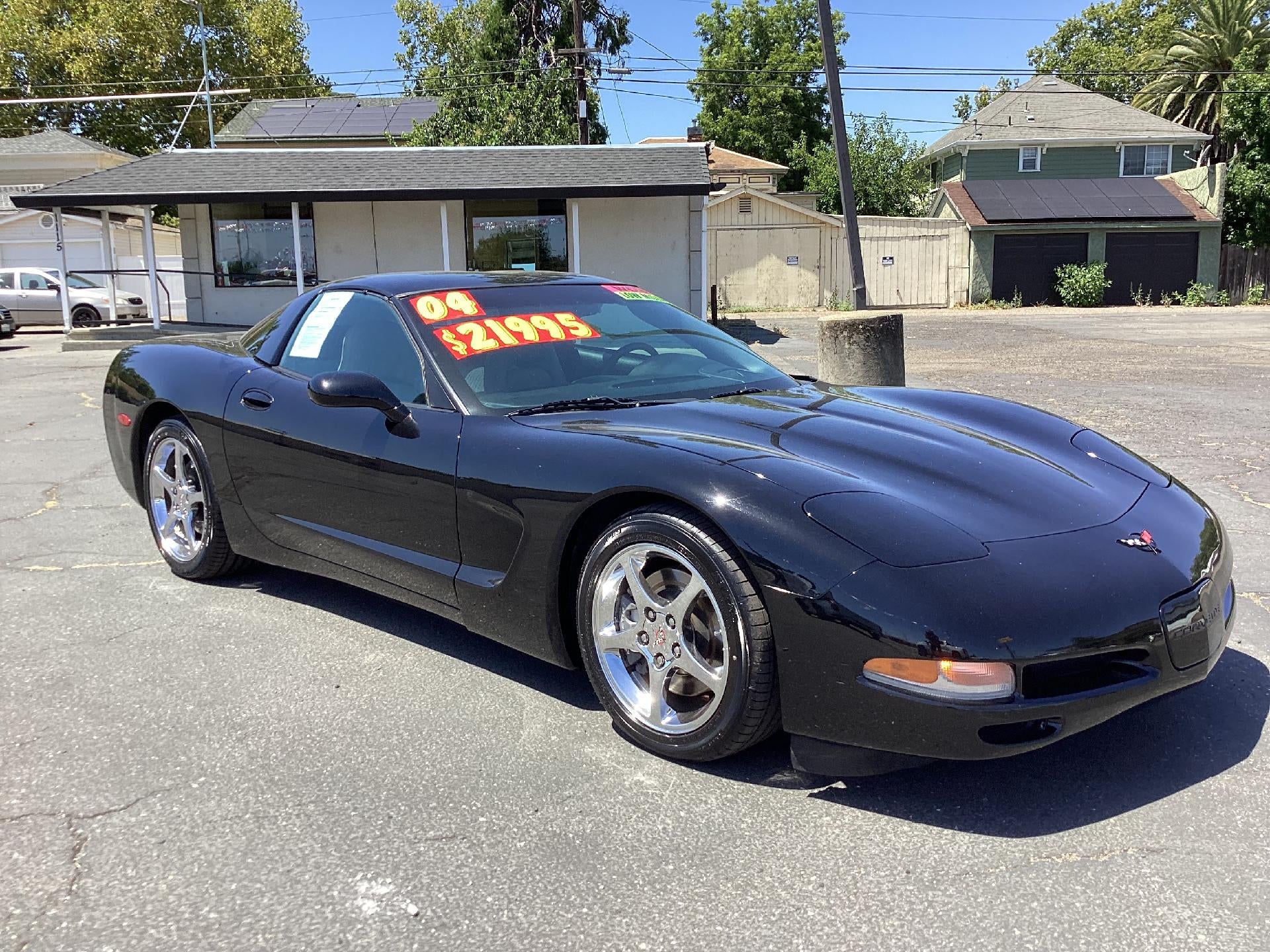 2004 Chevrolet Corvette Base in Black — front three-quarter view