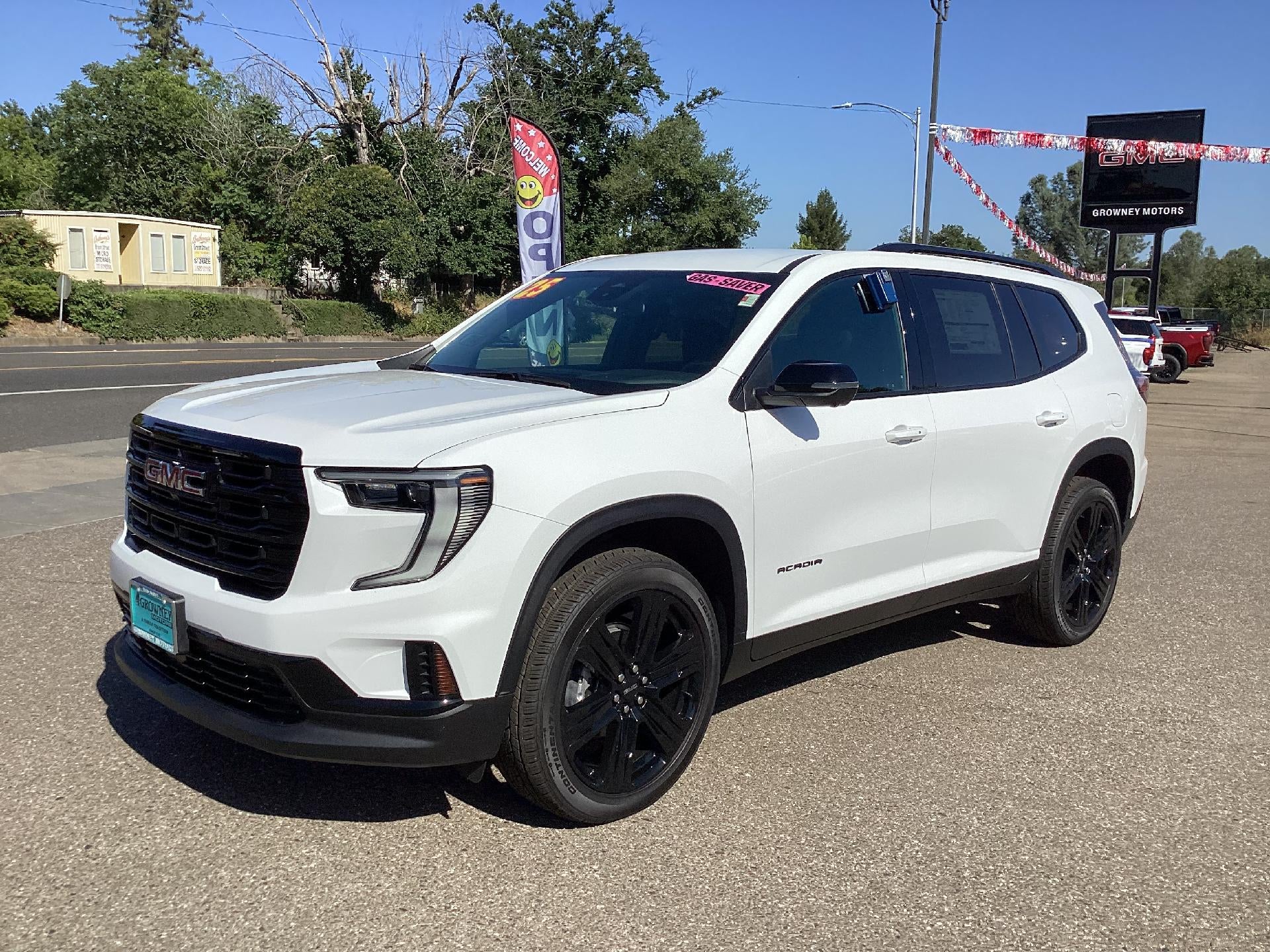 2025 GMC Acadia Elevation in Summit White — front three-quarter view