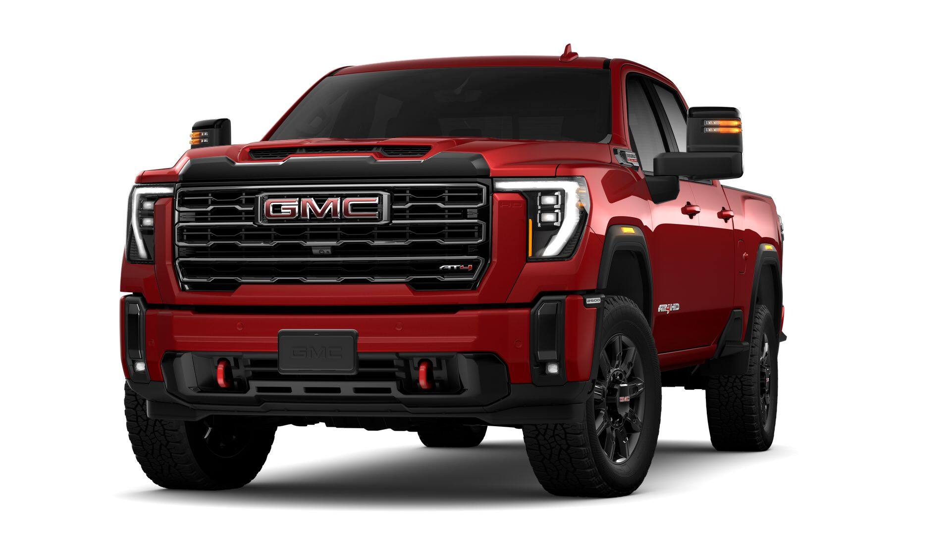 2026 GMC Sierra 2500 HD AT4 in Volcanic Red Tintcoat — front three-quarter view